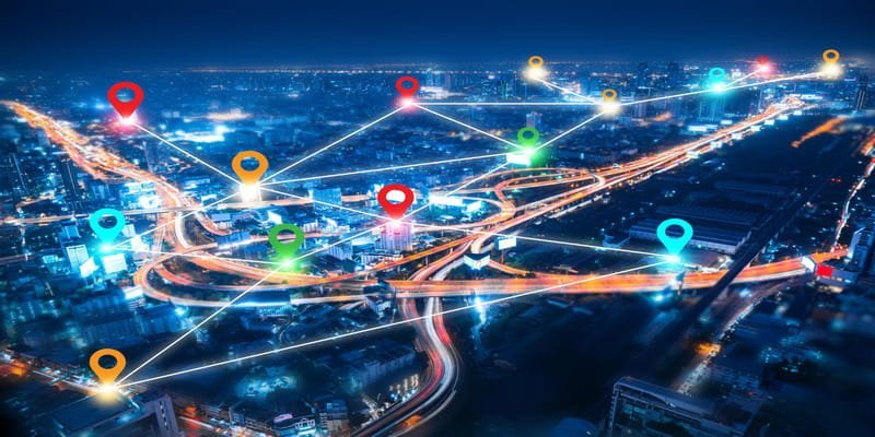 Connected store locations across a city at night