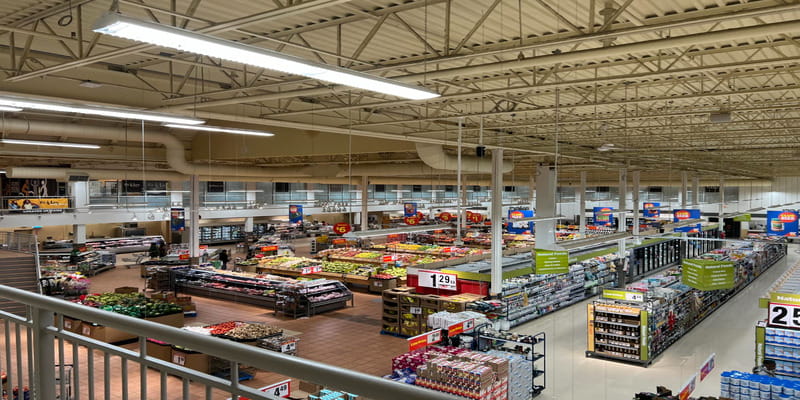 Vast supermarket sales floor seen from above